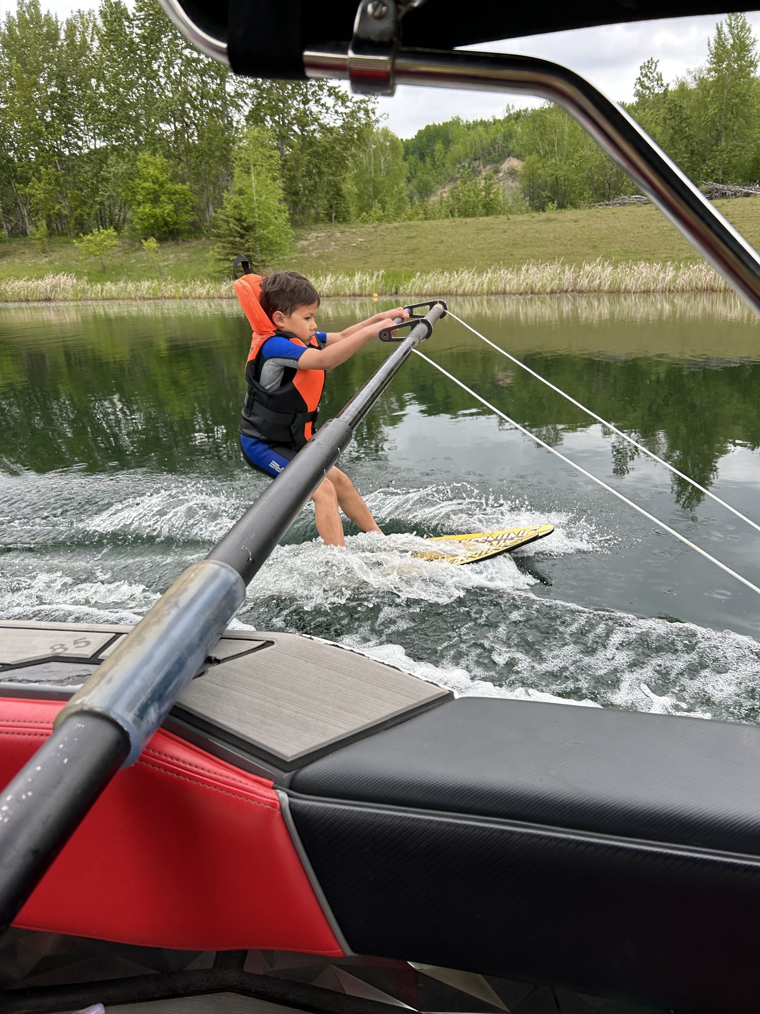 Young skier being coached on the water at Shalom Park — where every generation begins