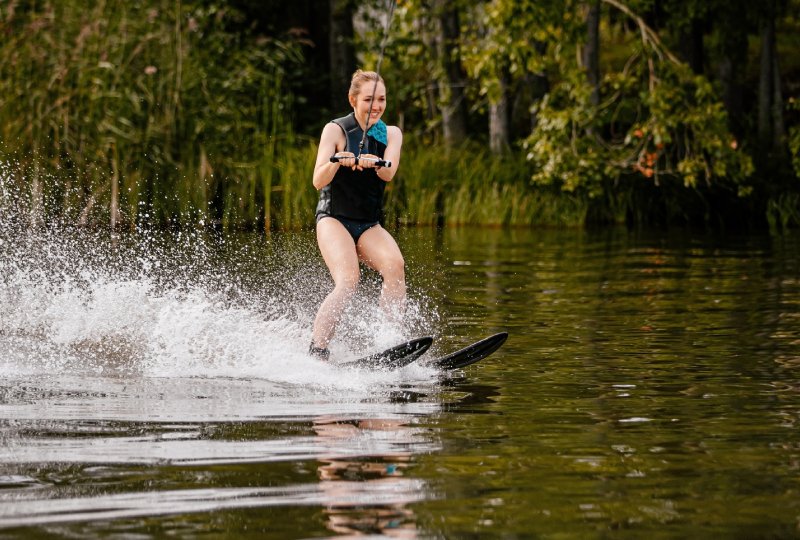 Beginner learning to waterski at Shalom Park — coached session on the boom